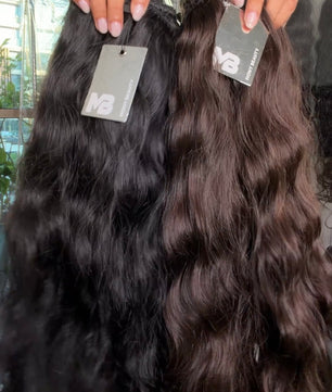 Two bundles of Loose wavy hair extensions in black & brown